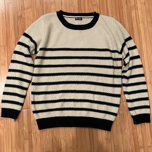 Black and off-white striped sweater